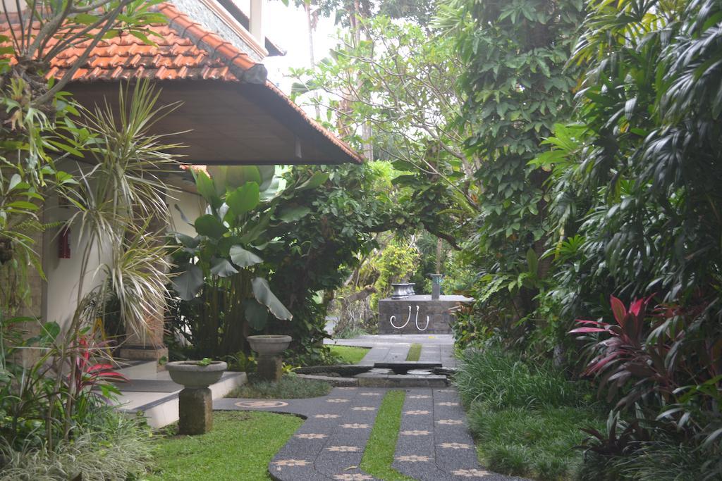 Отель The Taman Ayu Семиньяк Экстерьер фото